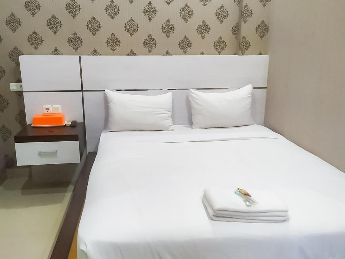 Reddoorz Syariah Near Sultan Syarif Kasim II Airport Hotel เปกันบารู ภายนอก รูปภาพ